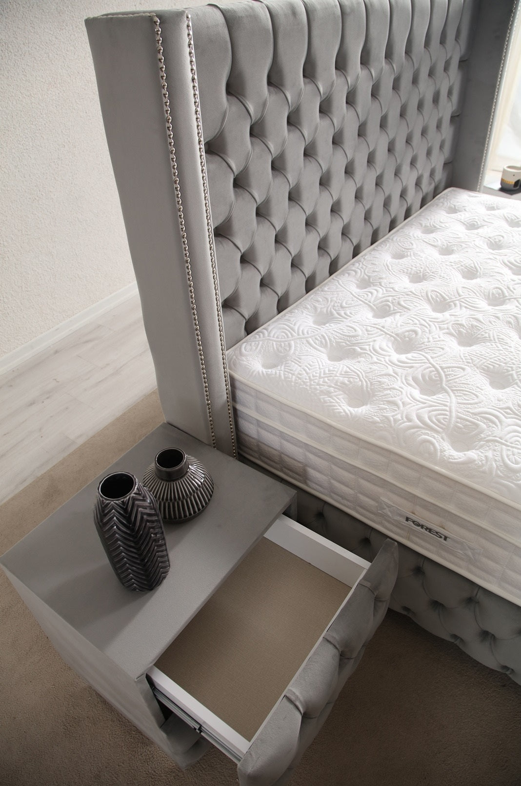 Spring Base Headboard Set with luxurious quilted design and storage base