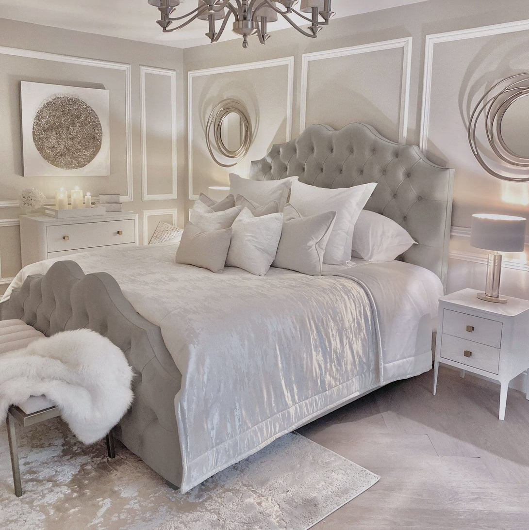 Belvoir Grey Luxury Curved Velvet Bed with a plush velvet finish and elegant curved headboard