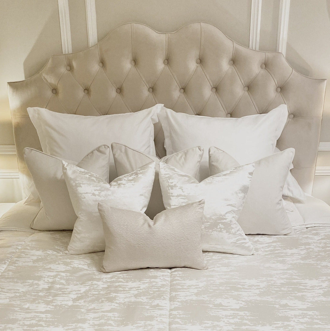 Belvoir Grey Luxury Curved Velvet Bed with a plush velvet finish and elegant curved headboard