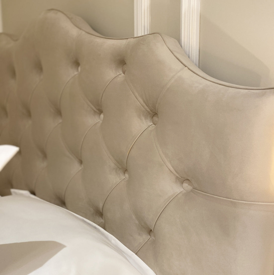 Belvoir Grey Luxury Curved Velvet Bed with a plush velvet finish and elegant curved headboard