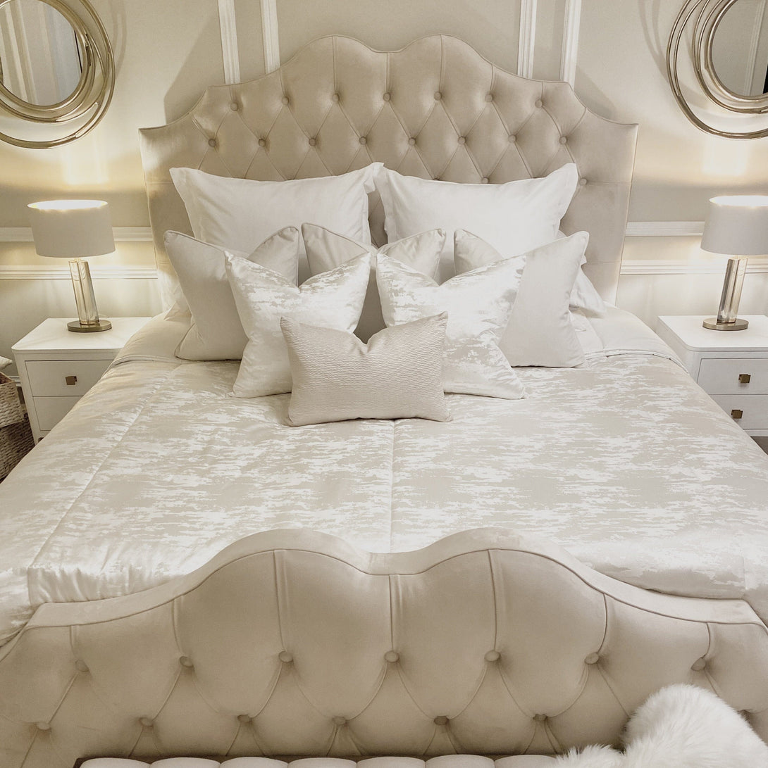 Belvoir Grey Luxury Curved Velvet Bed with a plush velvet finish and elegant curved headboard