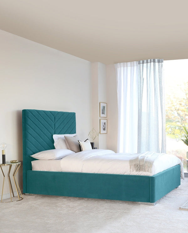 Leo Velvet Bed with a tufted headboard and plush velvet upholstery