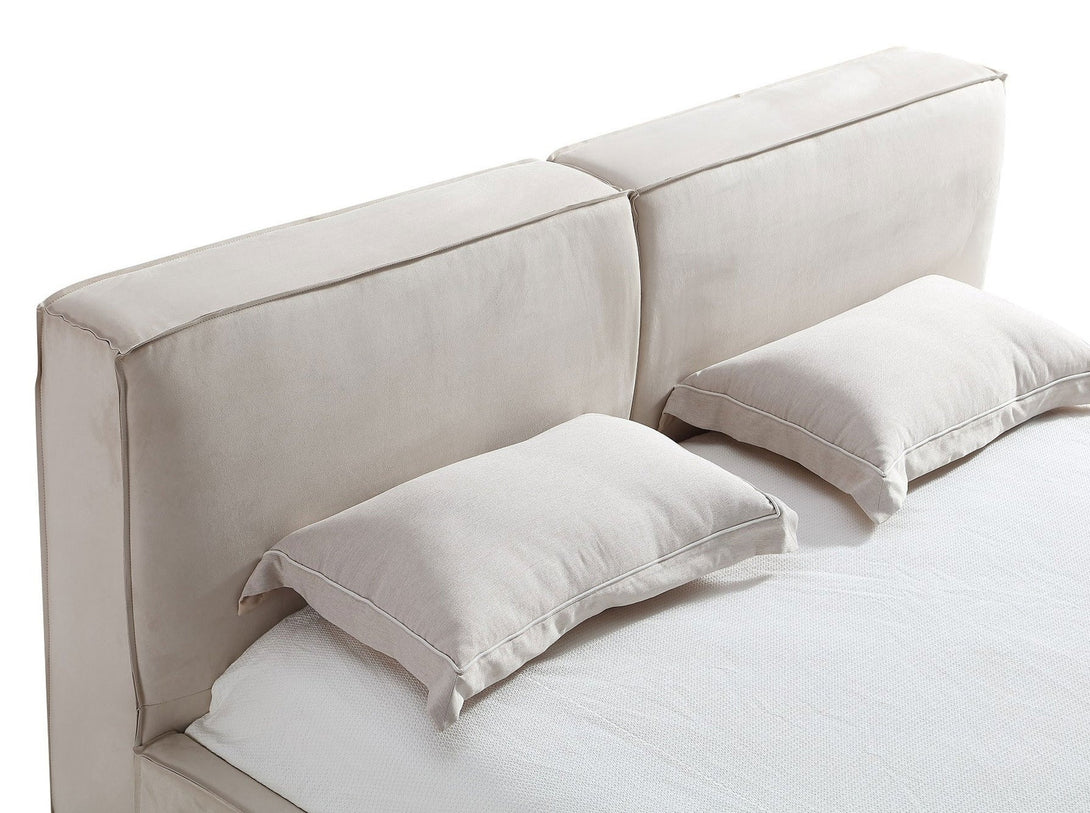 Serene Platform Bed with sleek wooden frame and upholstered headboard for modern bedrooms.