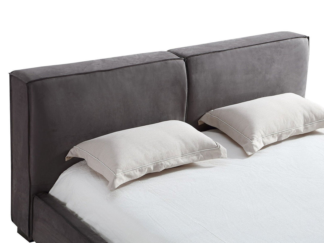 Serene Platform Bed with sleek wooden frame and upholstered headboard for modern bedrooms.