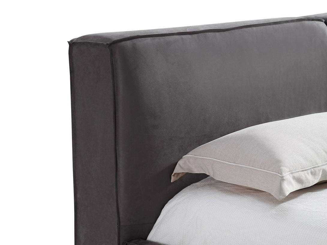 Serene Platform Bed with sleek wooden frame and upholstered headboard for modern bedrooms.