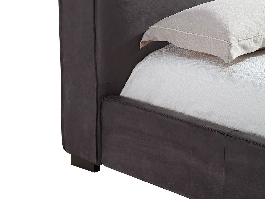 Serene Platform Bed with sleek wooden frame and upholstered headboard for modern bedrooms.