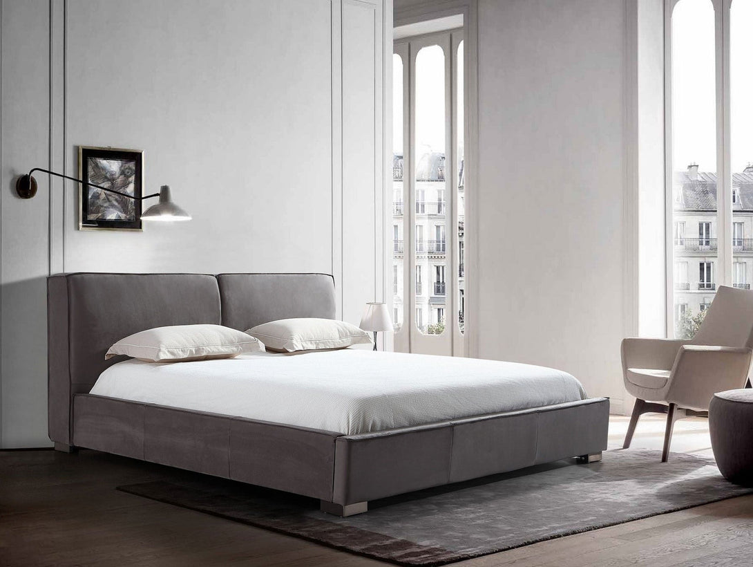 Serene Platform Bed with sleek wooden frame and upholstered headboard for modern bedrooms.