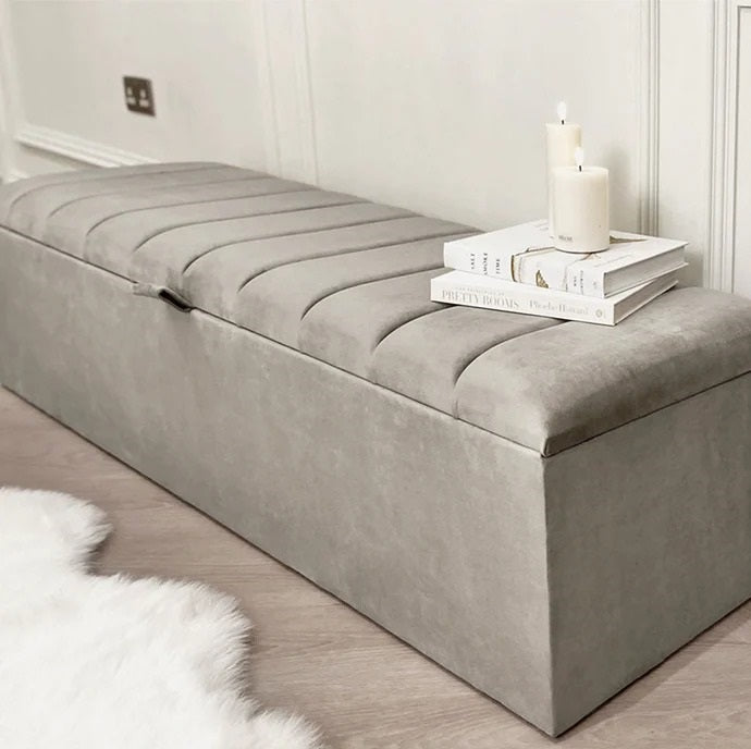 Zana Grey Panelled Ottoman featuring a modern design and plush cushioning for elegant home decor.